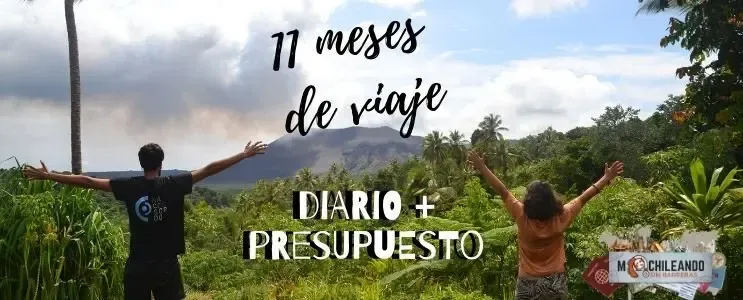Portada «11 meses de viaje, diario y presupuesto» con una persona con los brazos abiertos en un paisaje tropical